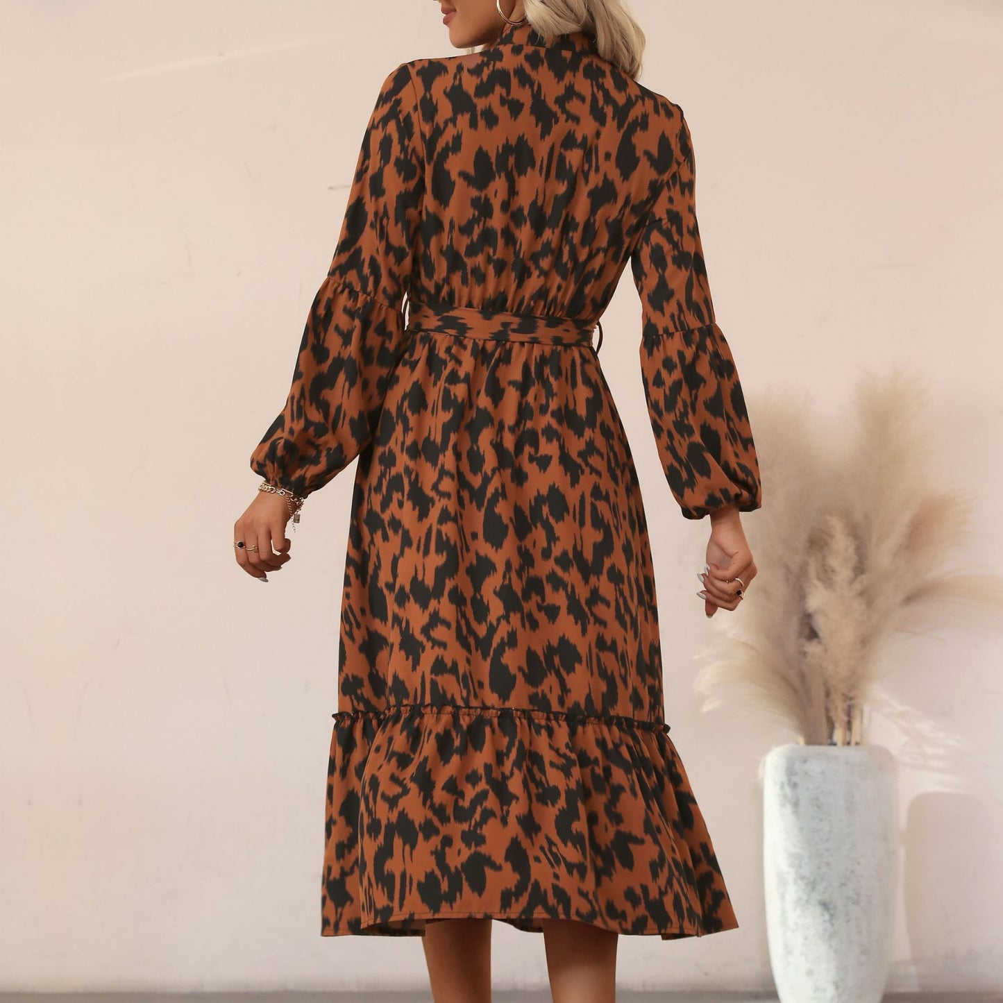 Mid length long sleeved half high neck leopard print dress